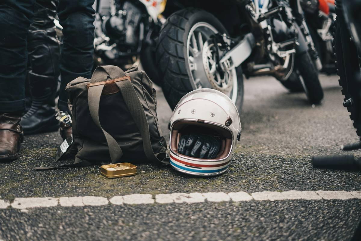 Infographic showing coverage gaps: 68% of travel policies exclude motorcycles; only 22% include legal assistance funds